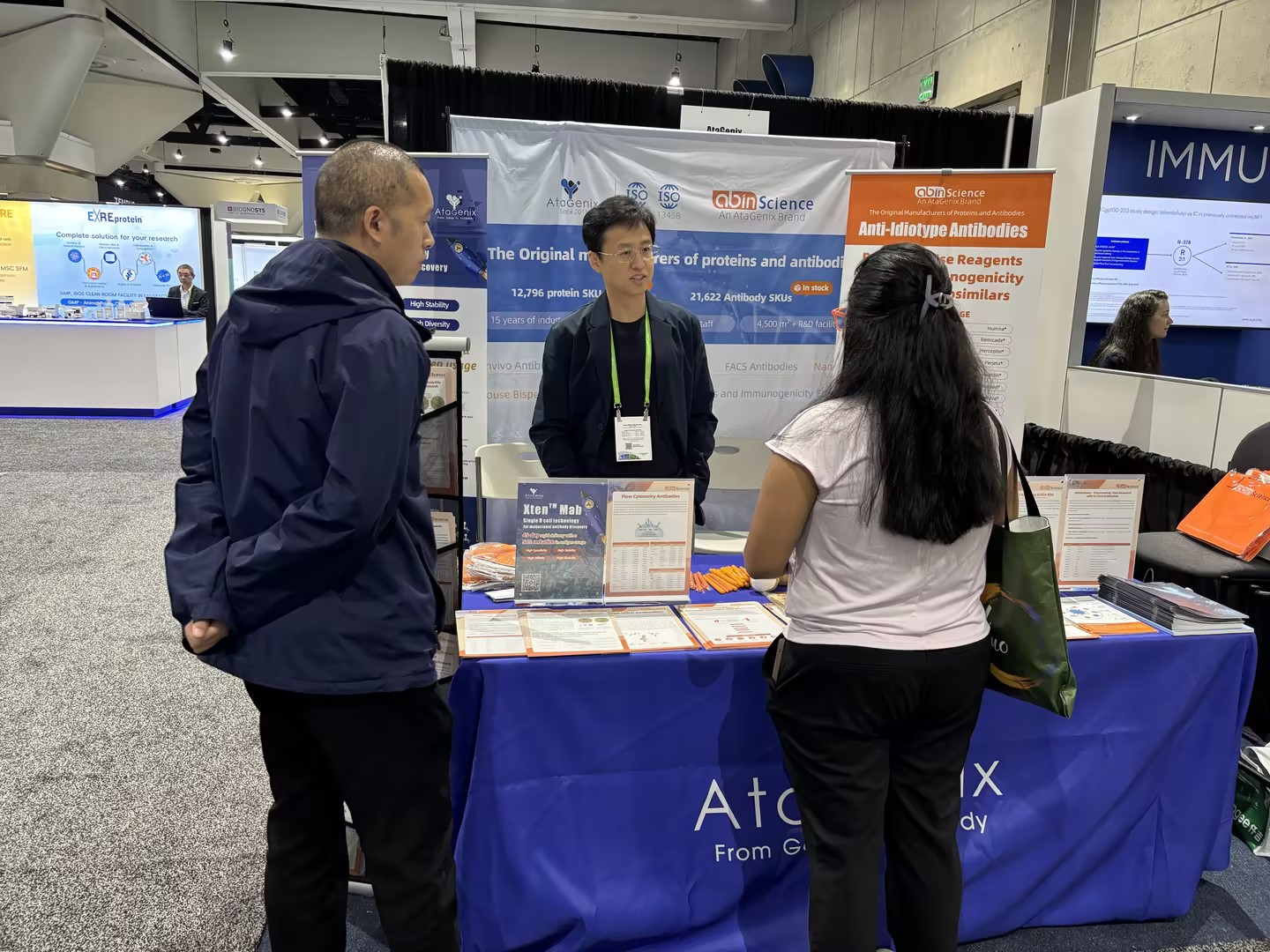 AtaGenix booth consultation with researcher at AACR 2026